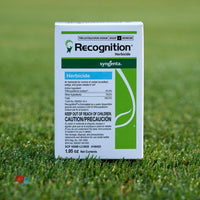 Recognition Herbicide - Broadleaf and Sedge Weed Control for Warm Season Turf Recognition herbicide box on golf course lawn