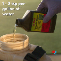 Hi-Yield Spreader Sticker Non-Ionic Surfactant - 16 oz Pouring spreader sticker into sprayer