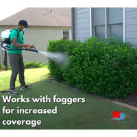 Spraying shrubs with Mirimichi Green Pest Control